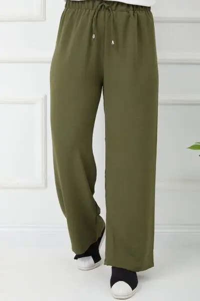 شلوار پارچه ای بگ کمر کش زنانه زیتونی برند Bayanca Moda