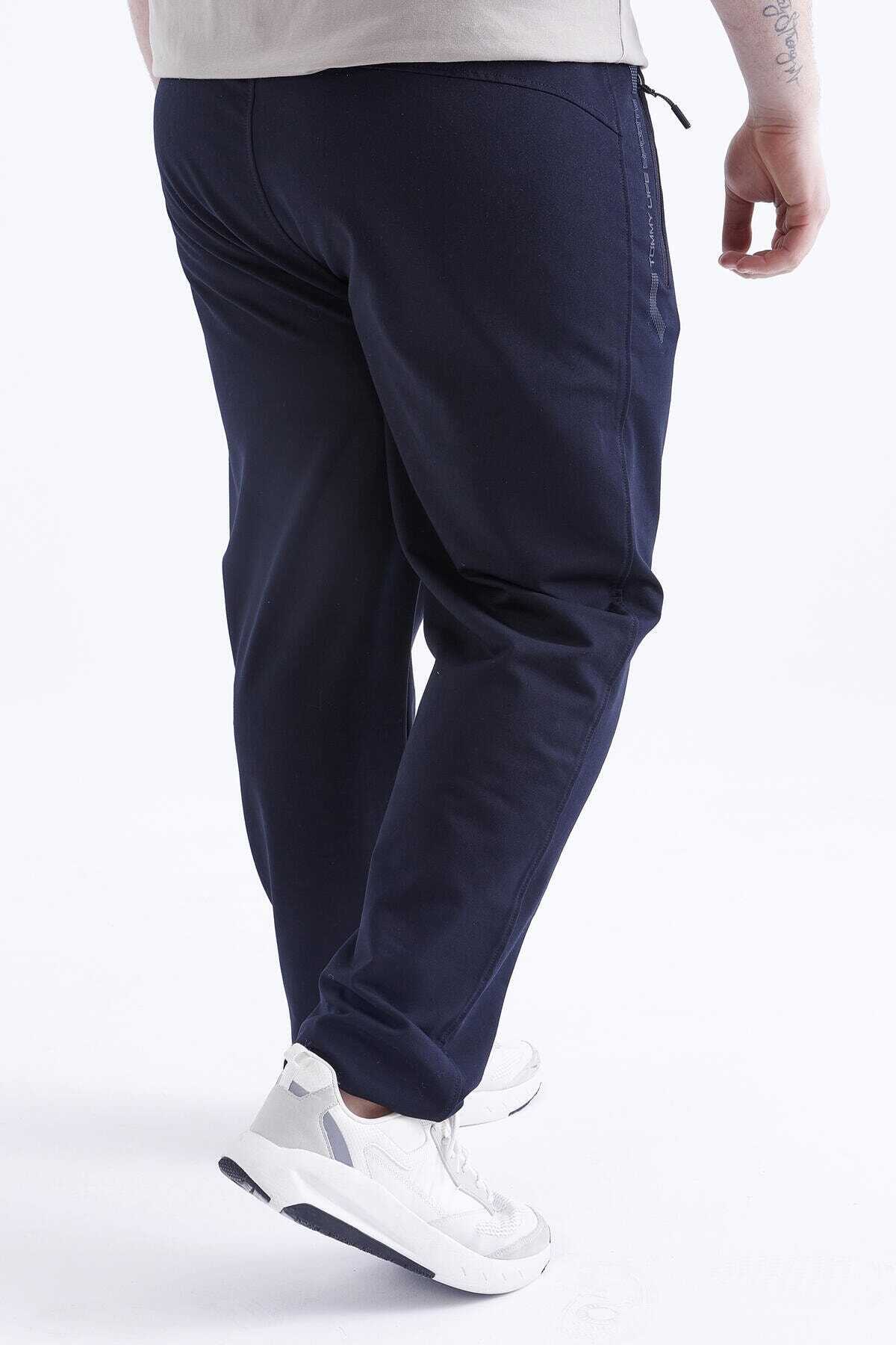 شلوار گرمکن جیب زیپ دار سایز بزرگ مردانه سرمه ای تیره برند Tommy Life