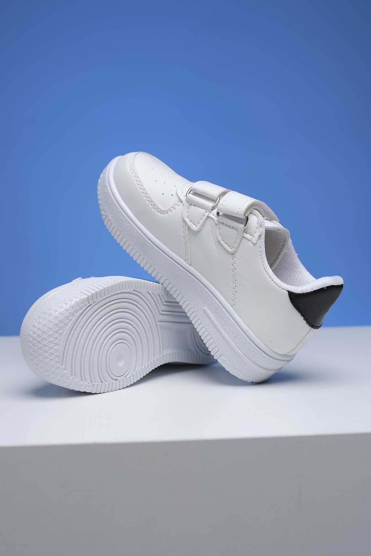 کفش بچه گانه یونیسکس ونس لژ دار مدل Arzel Air سفید مشکی برند Oksit