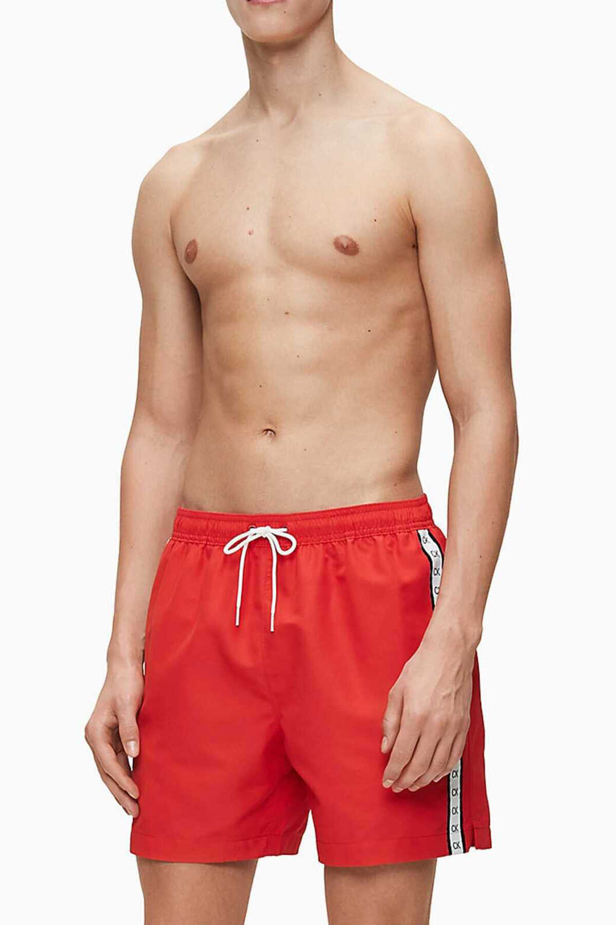 شورت مایو مردانه جیب دار طرح دار گلبهی برند Calvin Klein