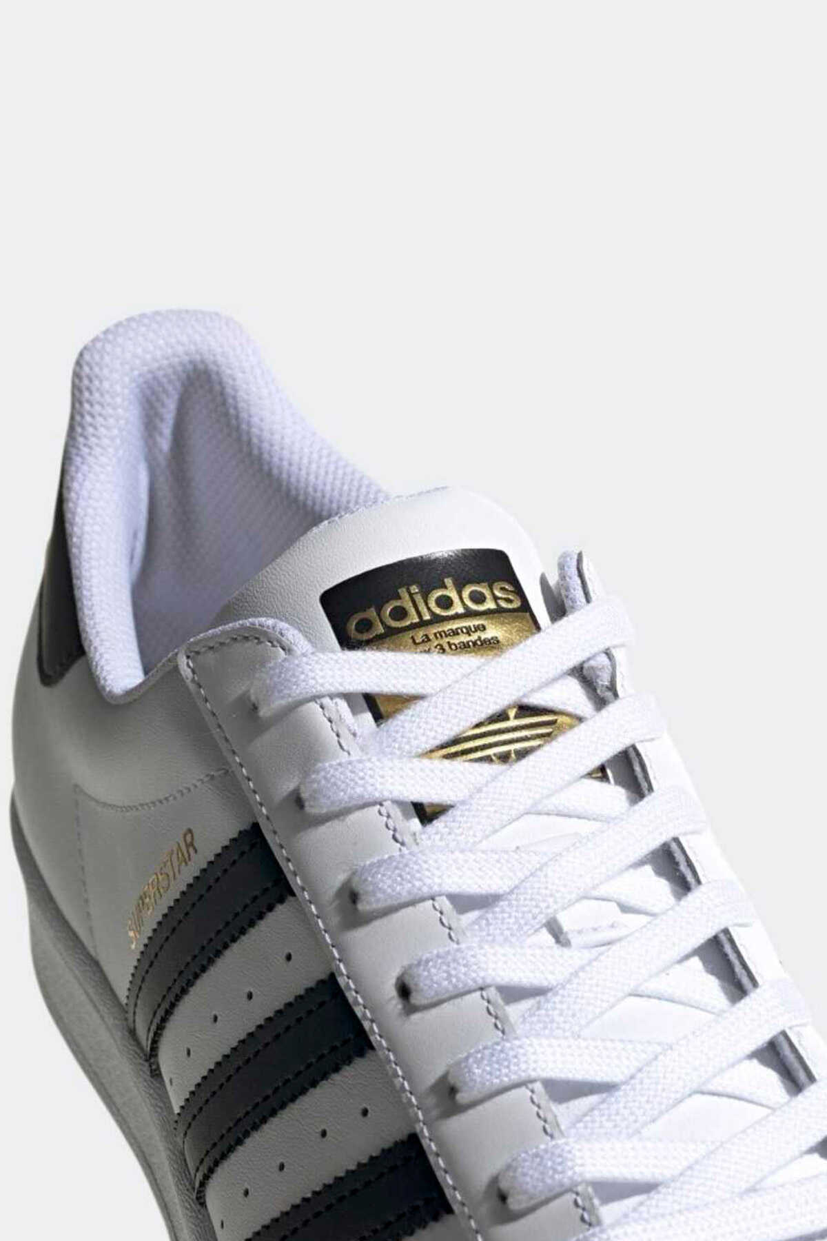 کفش تنیس یونیسکس سفید مشکی برند adidas 