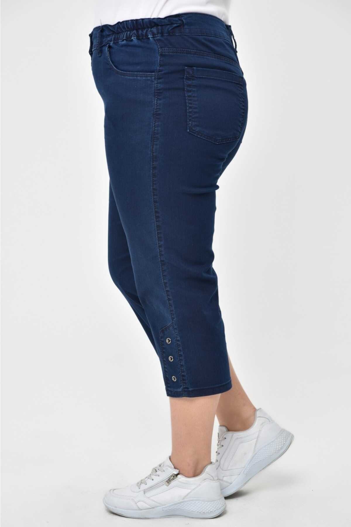 شلوارک جین کاپری بلند سایز بزرگ کمر کنار کش زنانه سرمه ای 