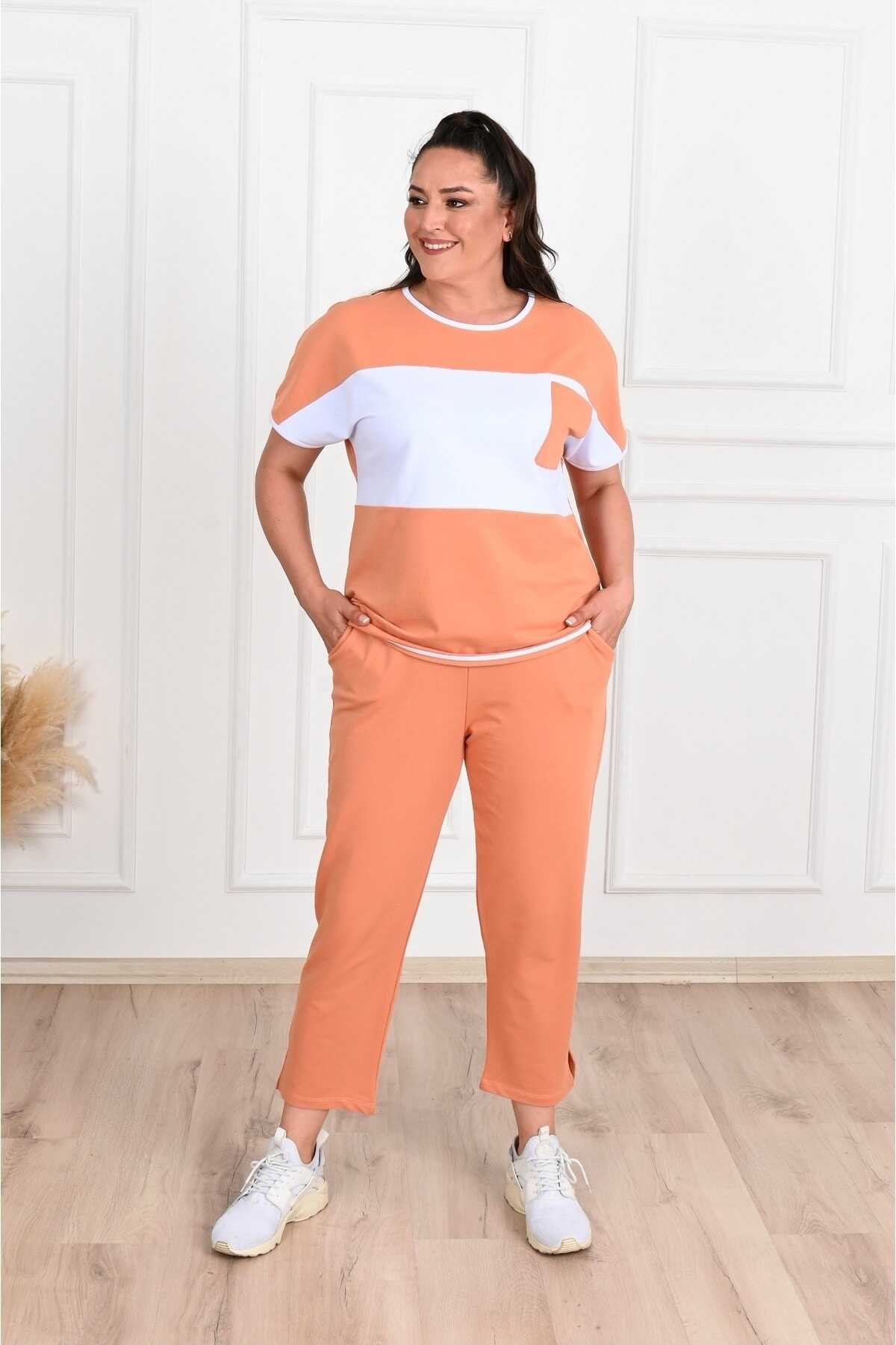 ست لباس ورزشی زنانه سایز بزرگ طرح دار نارنجی برند Koza 